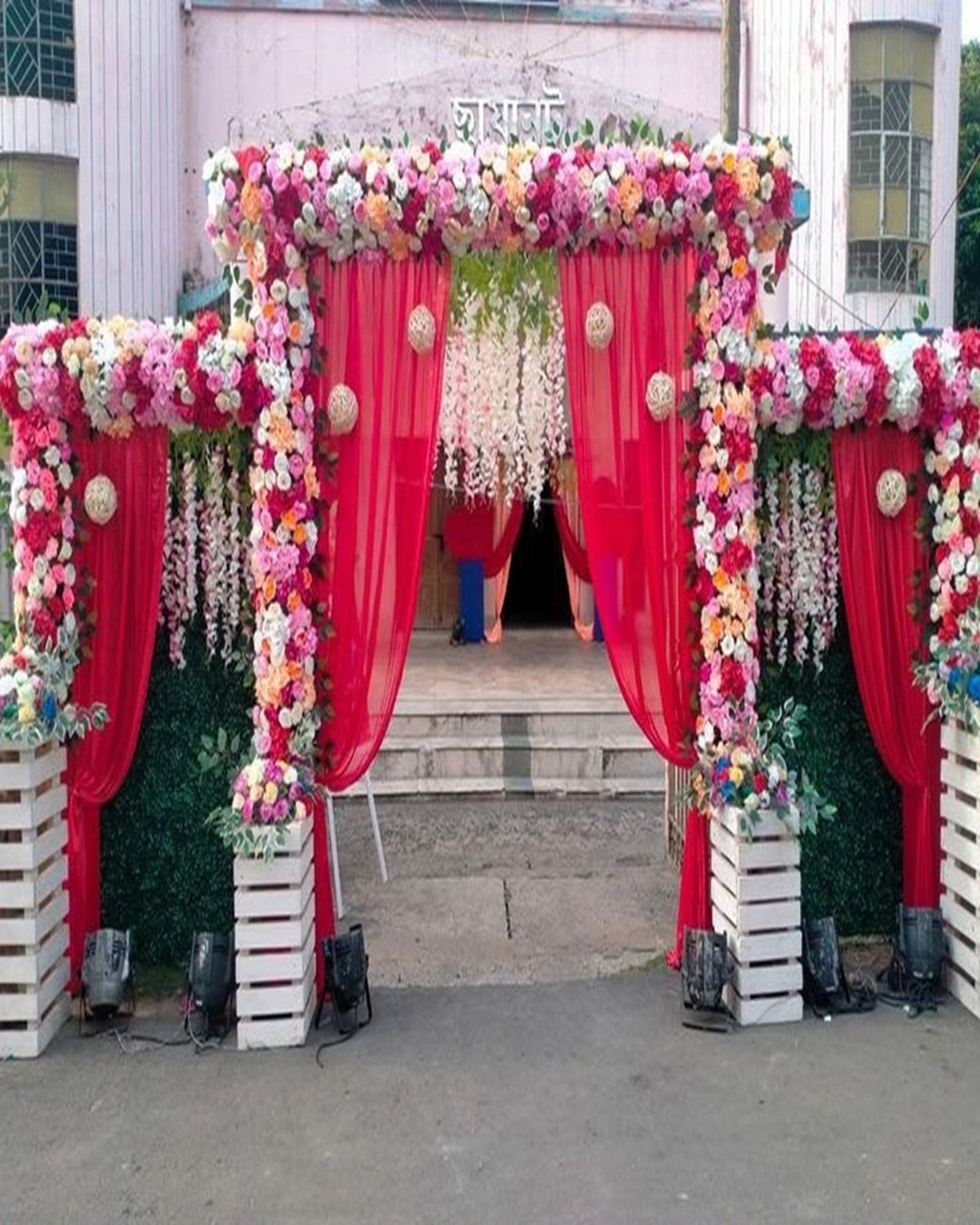 Mixed floral and greenery wall anniversary